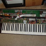 Yamaha DX7 open with keyboard in place